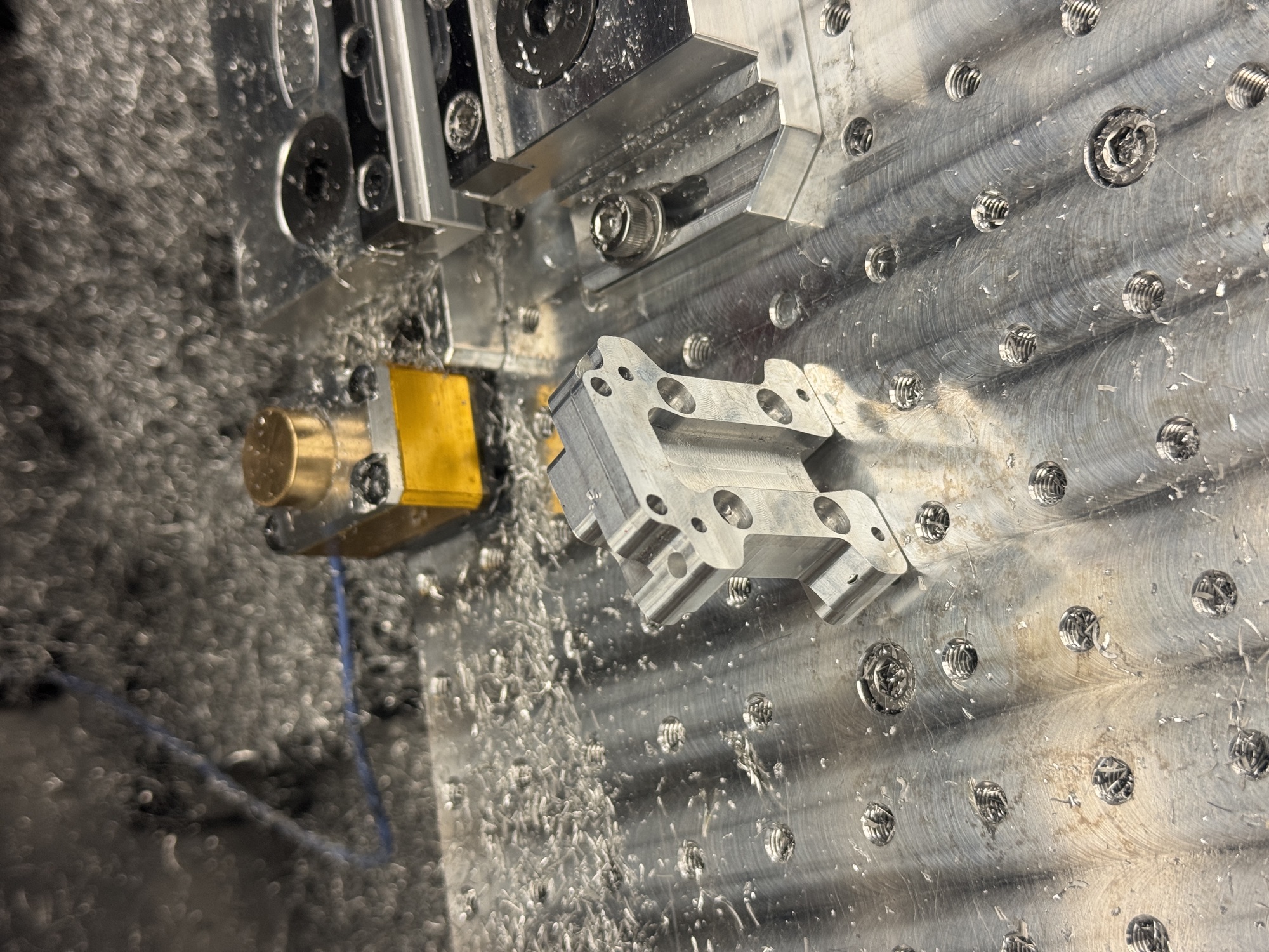 Carriage mid-machining on the CNC bed